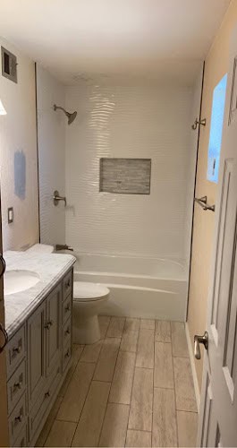 RR De La Cruz Shower & More LLC