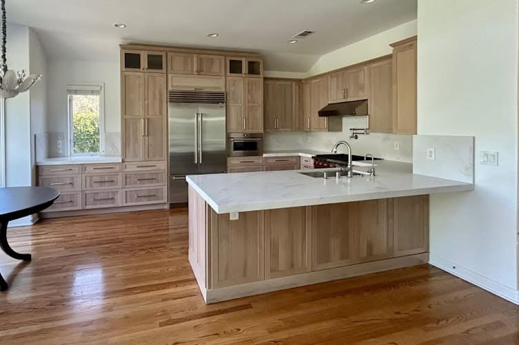 Luxiomer's Cabinets, Countertops, Shower Walls & Flooring. Kitchen & Bathroom Remodeling