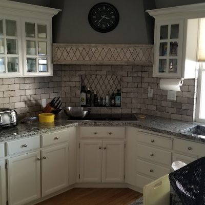 Above & beyond tile & stone