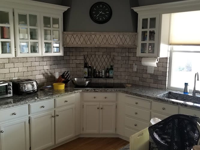 Above & beyond tile & stone