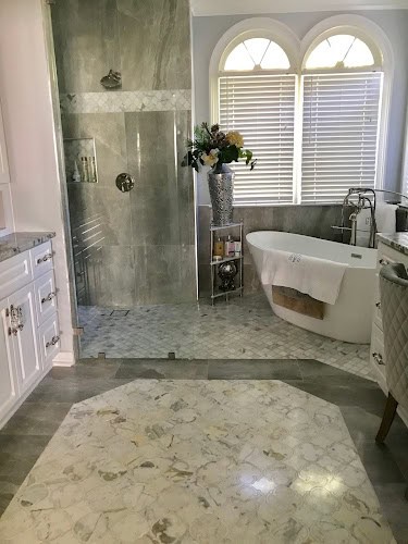 Experts Flooring , Kitchens & Bath