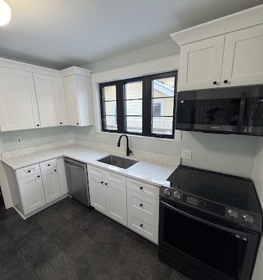 Sander Tile Inc