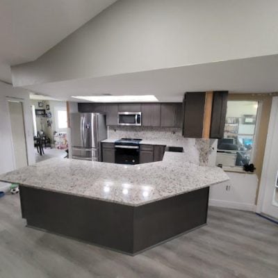 Lugo's Natural Stone Work, Cabinets & LVP