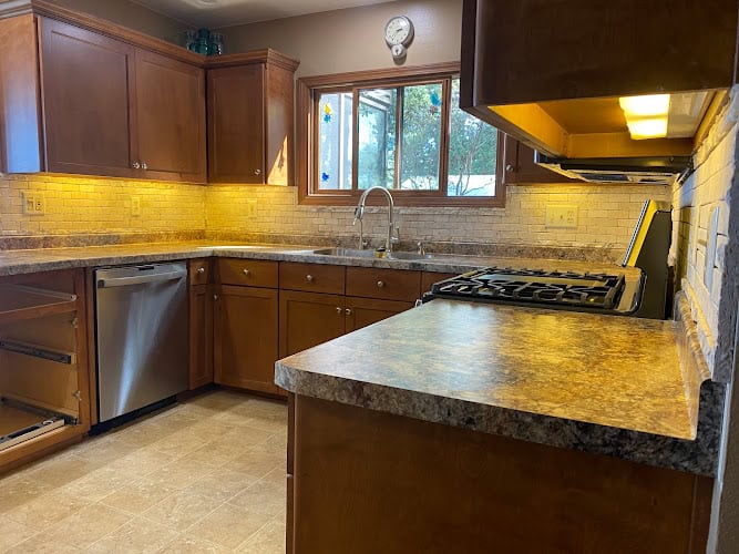 J & M Refacing Inc