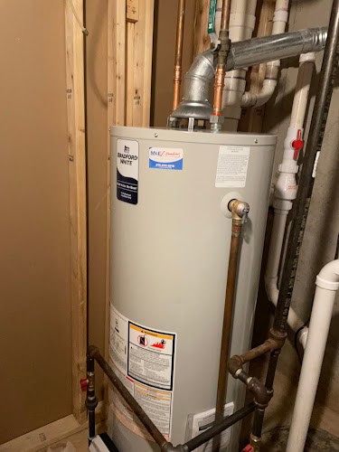 M & E Plumbing Service Inc